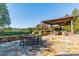 Outdoor patio with seating area, stone flooring and grill at 300 Eagle Bend Dr, Waxhaw, NC 28173