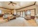 Spacious recreation room with comfy seating and access to outdoor patio at 300 Eagle Bend Dr, Waxhaw, NC 28173