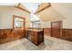 Basement wet bar with granite countertop and mini-fridge at 300 Eagle Bend Dr, Waxhaw, NC 28173