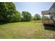 Expansive backyard featuring a well-maintained lawn and lush green trees at 4684 Hopsack Dr # Cal0105, Indian Trail, NC 28079