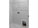 Clean laundry room with white tile floor, upper shelving, and utility connections at 4684 Hopsack Dr # Cal0105, Indian Trail, NC 28079