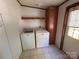 Laundry room with a washer, dryer, and built-in cabinet at 6261 Burnhurst Ln, Denver, NC 28037