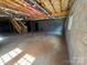 A spacious unfinished basement with high ceilings and exposed ductwork, ready for customization at 2290 9Th Avenue Ne Dr, Hickory, NC 28601