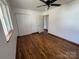 Bedroom with hardwood floors, large closet, and natural light from a window at 2290 9Th Avenue Ne Dr, Hickory, NC 28601