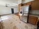 Kitchen with stainless steel refrigerator and oak cabinets at 2290 9Th Avenue Ne Dr, Hickory, NC 28601