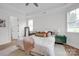 Neutral bedroom with plenty of natural light and luxury vinyl floors at 7245 Static Way, Sherrills Ford, NC 28673