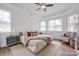 Spacious bedroom with tray ceiling, neutral decor and lots of natural light at 7245 Static Way, Sherrills Ford, NC 28673