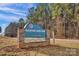 Scenic community park sign with a stone base, inviting you to explore nature and recreational opportunities at 7245 Static Way, Sherrills Ford, NC 28673