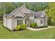 Beautiful single Gathering home with stone and stucco exterior and a well-maintained lawn at 7245 Static Way, Sherrills Ford, NC 28673