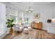 Bright living room with lots of natural light, hardwood floors, and neutral decor at 7245 Static Way, Sherrills Ford, NC 28673