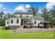 House exterior showcasing a deck, gazebo and nicely landscaped backyard at 5811 Kristi Ln, Midland, NC 28107