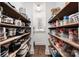 Large walk-in pantry with ample shelving for storage at 5811 Kristi Ln, Midland, NC 28107