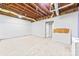 Partially finished basement awaiting your personal touch, with drywall and exposed ceiling at 115 E Georgia Ave, Bessemer City, NC 28016