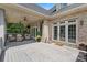 Spacious back patio with seating area, perfect for outdoor entertaining at 8516 Mcilwaine Rd, Huntersville, NC 28078