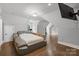 Spacious Primary bedroom with large bed and built-in shelving at 8516 Mcilwaine Rd, Huntersville, NC 28078