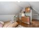 Multi-functional bonus room with kitchenette and separate sleeping area at 8516 Mcilwaine Rd, Huntersville, NC 28078