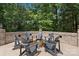 Relaxing outdoor fire pit area with seating for multiple guests at 8516 Mcilwaine Rd, Huntersville, NC 28078