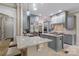 Gourmet kitchen with granite countertops and stainless steel appliances at 8516 Mcilwaine Rd, Huntersville, NC 28078