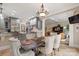 Spacious kitchen with island, stainless steel appliances, and eat-in area at 8516 Mcilwaine Rd, Huntersville, NC 28078