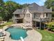 Luxury pool with spacious deck and plenty of lounge space at 8516 Mcilwaine Rd, Huntersville, NC 28078