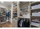 Large walk-in closet with custom built-ins and organizers at 8516 Mcilwaine Rd, Huntersville, NC 28078