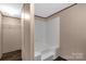 Bathroom with tub and shower, and closet at 850 Mereva Rd, Smyrna, SC 29743