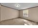 Bright bedroom with a window and carpet flooring at 850 Mereva Rd, Smyrna, SC 29743