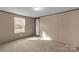 Bright bedroom with a window and carpet flooring at 850 Mereva Rd, Smyrna, SC 29743