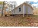 Side view of gray house with wooden deck and brick base at 850 Mereva Rd, Smyrna, SC 29743
