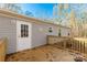 House exterior showcasing a white door and wooden deck at 850 Mereva Rd, Smyrna, SC 29743