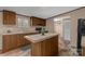 Kitchen with island and ample cabinetry at 850 Mereva Rd, Smyrna, SC 29743