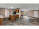 Open concept kitchen with island and view to living room at 850 Mereva Rd, Smyrna, SC 29743