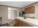 Kitchen island with granite countertop and cabinets at 850 Mereva Rd, Smyrna, SC 29743