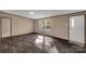 Living room with hardwood floors and large windows at 850 Mereva Rd, Smyrna, SC 29743