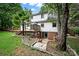 Back exterior with multi-level deck and patio area leading to the basement walkout at 9143 Sadlers Ridge Rd, Fort Mill, SC 29707