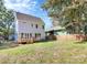 Spacious backyard with grass and a deck at 3230 Rogers St, Charlotte, NC 28208