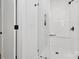 Contemporary bathroom shower featuring tiled walls, glass doors, and sleek design at 3230 Rogers St, Charlotte, NC 28208