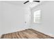 Bright bedroom with hardwood floors, a window, and a ceiling fan at 3230 Rogers St, Charlotte, NC 28208