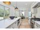 Gourmet kitchen with large island, stainless steel appliances, and open floor plan at 3230 Rogers St, Charlotte, NC 28208