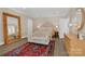 Guest bedroom with hardwood floors, a cozy sitting area, and ample storage at 104 Hidden Cove Dr, Shelby, NC 28150
