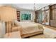 Main bedroom with large closets, hardwood floors, and a tranquil view at 104 Hidden Cove Dr, Shelby, NC 28150