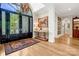 Elegant entryway with black double doors, hardwood floors, and a console table at 104 Hidden Cove Dr, Shelby, NC 28150