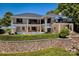 Stunning lakefront home with stone wall and pool at 104 Hidden Cove Dr, Shelby, NC 28150