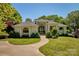 Elegant home with manicured lawn and curved driveway at 104 Hidden Cove Dr, Shelby, NC 28150