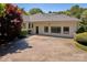 House exterior showcasing rear elevation, driveway, and landscaping at 104 Hidden Cove Dr, Shelby, NC 28150