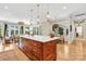 Modern kitchen with large island and hardwood floors at 104 Hidden Cove Dr, Shelby, NC 28150