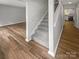 Inviting interior showcasing a staircase leading to upper floors and views of living spaces at 6003 Heath Valley Rd, Charlotte, NC 28210