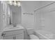 Clean bathroom with white vanity, bathtub, and shower at 808 Seigle Point Dr, Charlotte, NC 28204