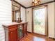Bathroom features antique vanity and stained glass window at 903 W Franklin St, Monroe, NC 28112