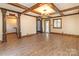 Formal dining room with hardwood floors, stained glass window and chandelier at 903 W Franklin St, Monroe, NC 28112